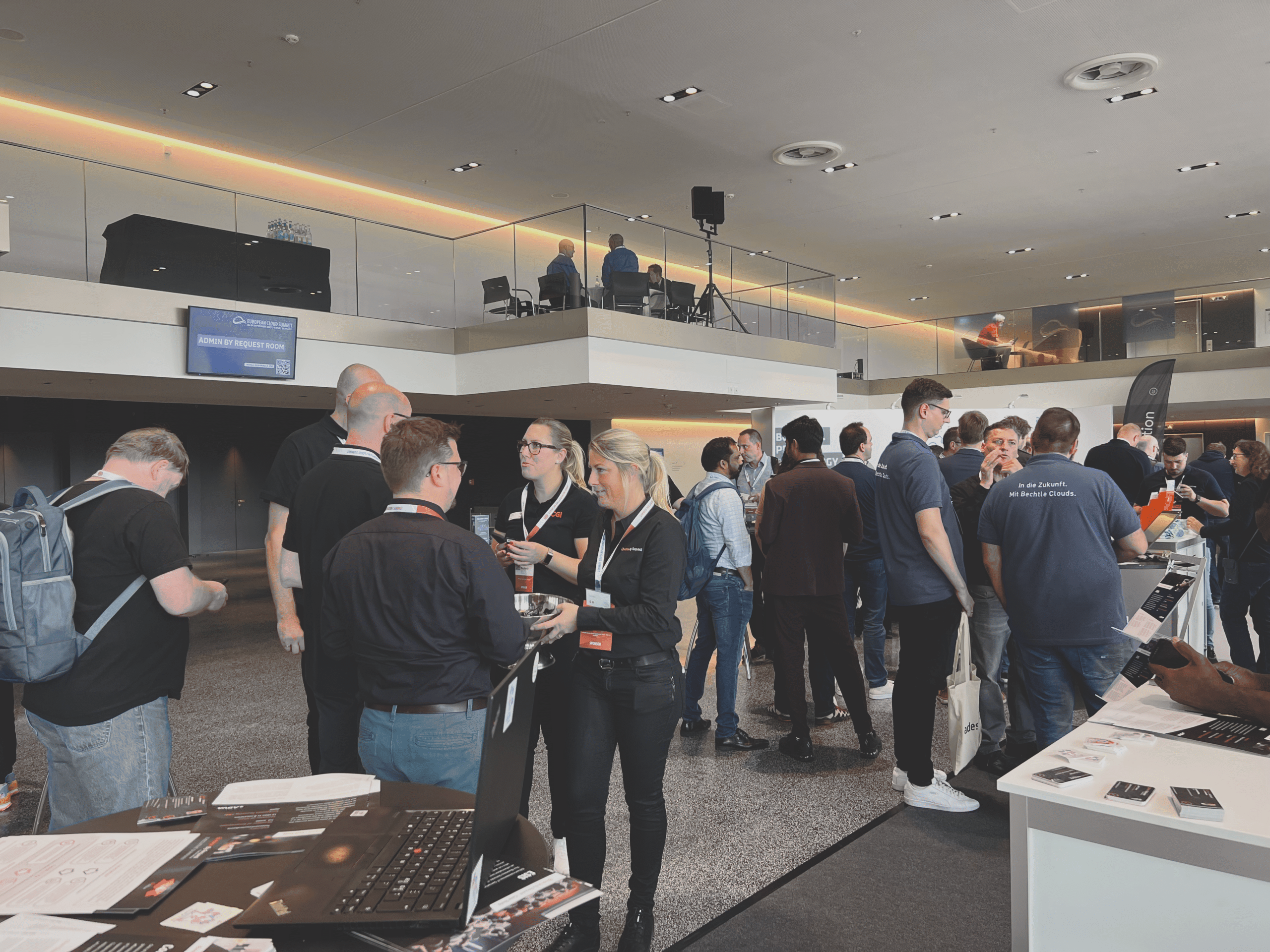 People behind the product. The admin by request team talking to customers at the european cloud summit 2022. » admin by request » admin by request