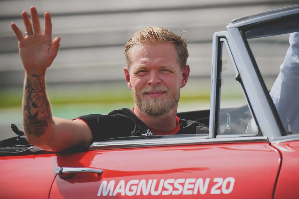 Kevin magnussen waving to fans in a car on race day before the f1 race » admin by request