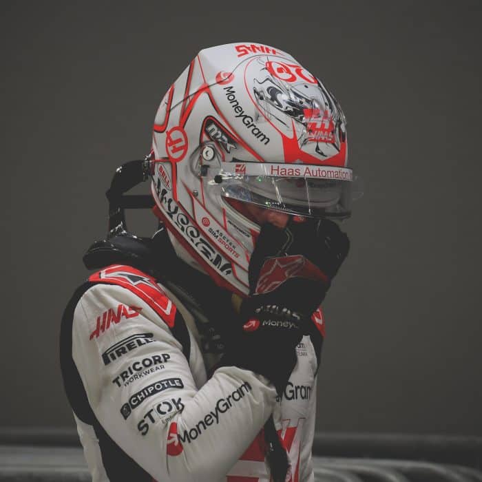 Kevin magnussen at the singapore grand prix adjusting his helmet 2023 » admin by request