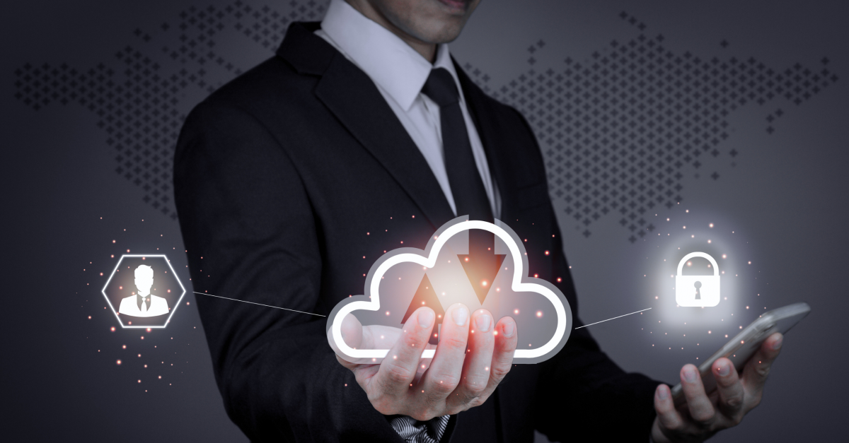 A man in a suit holding a neon light cloud with a remote access symbol inside it