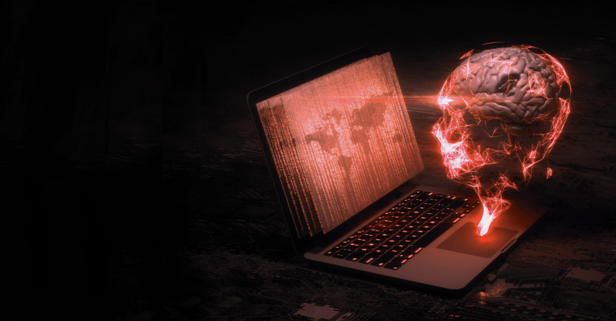 Digital artwork of a red human head hologram using a laptop.